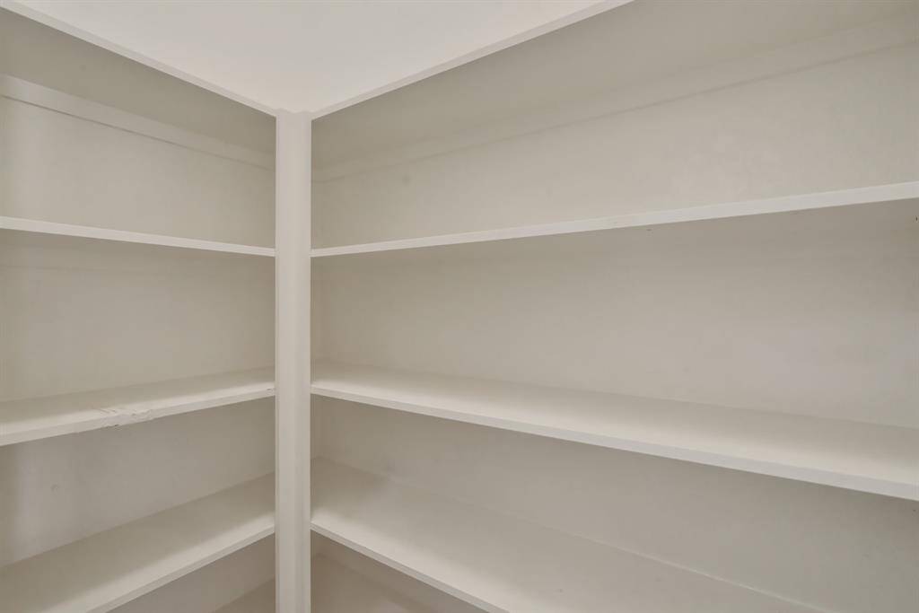 This picture does not really do this pantry justice. There is room for tons of non-perishables, kitchen appliances, and more!