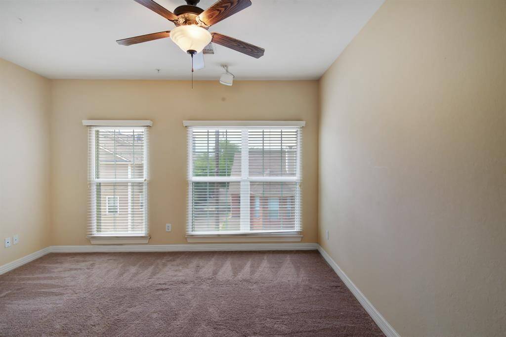 Welcome to the primary bedroom with plenty of space for a king sized bed.