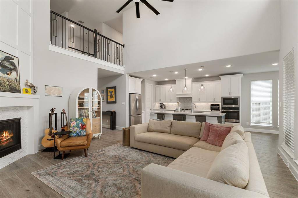 The open floorplan seamlessly extends into the kitchen, creating the perfect space for both entertaining guests and comfortable everyday living.
