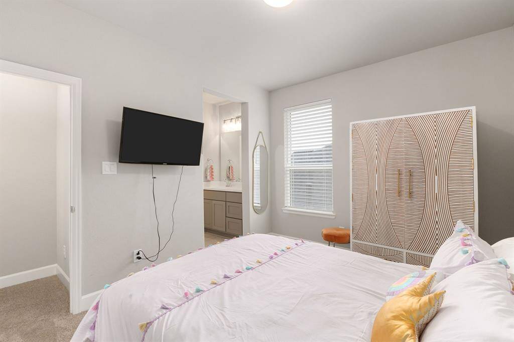 Adding to its appeal, the room connects to a stylish Jack and Jill bathroom and includes a generous walk-in closet for ample storage.