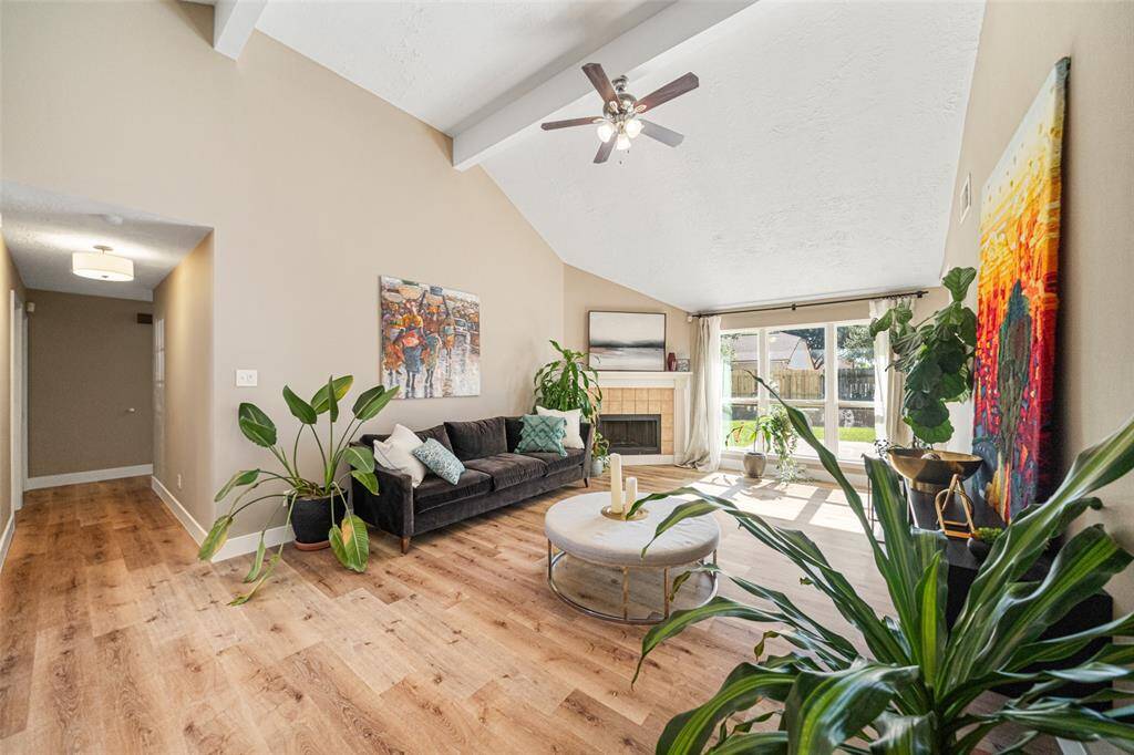 Generous common spaces with high ceilings that feel expansive and inviting.