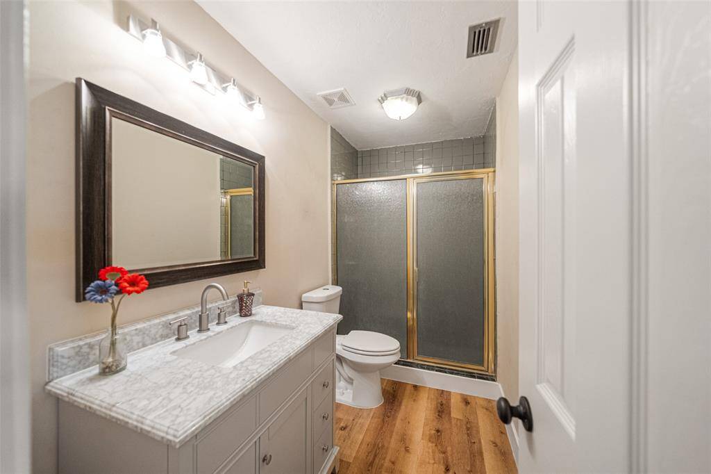 Modernized bathrooms with thoughtful updates.