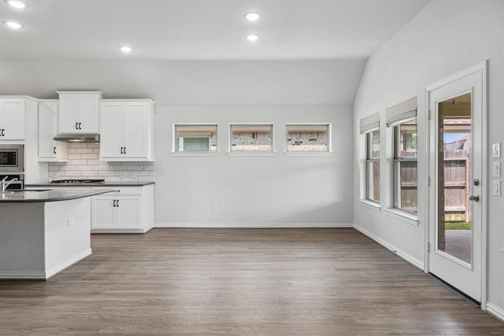 Dining room overlooks covered back patio