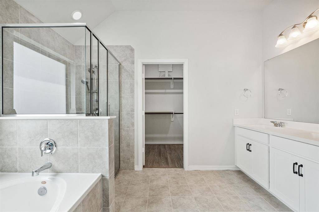 Primary bathroom with garden tub and separate shower