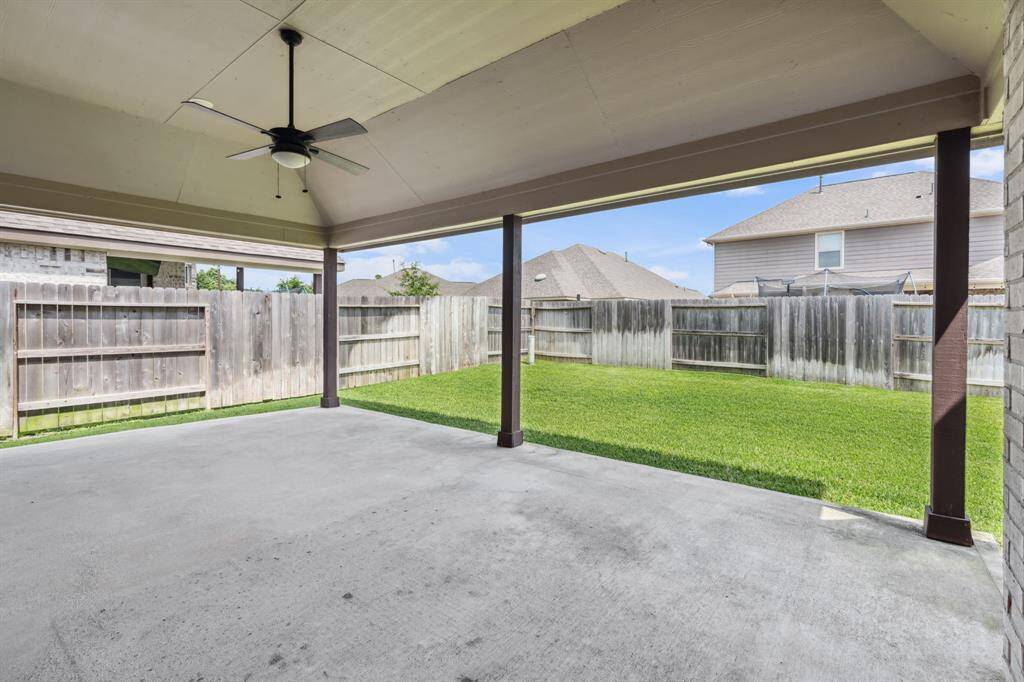 Back covered patio is 22 x 14 with ceiling fan