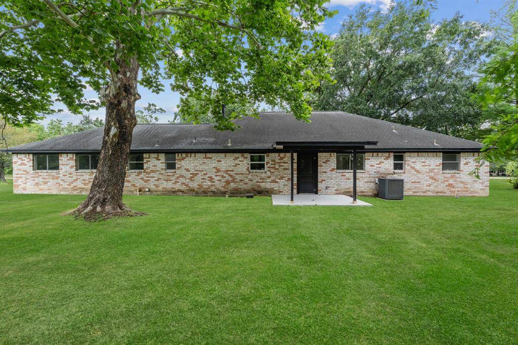 Fall in love with this view of the mature trees. Virtually staged grass.