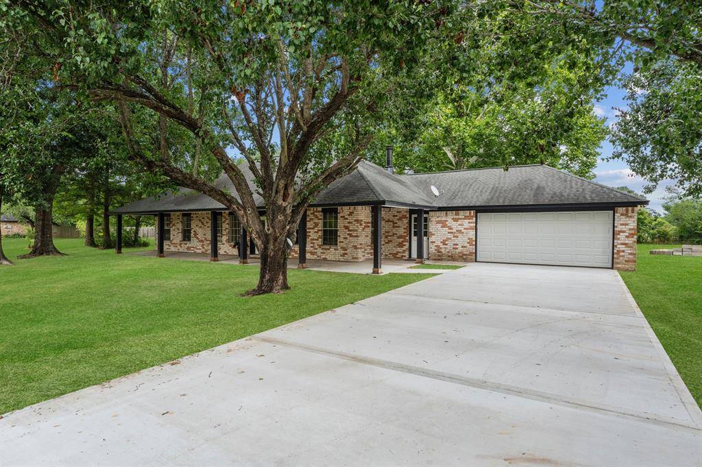 The newly poured driveway leads up to a welcoming front porch-an ideal spot to enjoy your morning coffee or unwind as the sun sets. Take a note of the freshly painted trim and columns, along with a brand-new garage door that adds to the home's appeal. Virtually staged grass.