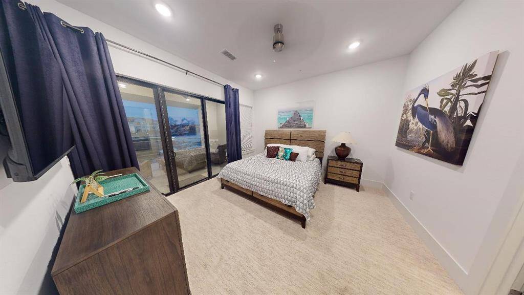 Primary Bedroom w Lake Views!