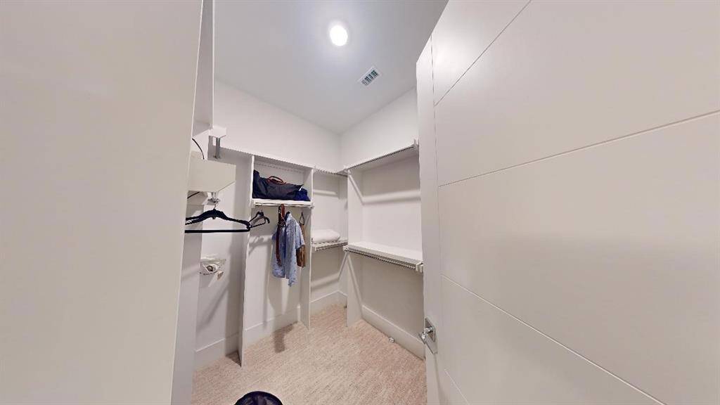 Walk-in Primary Bedroom  Closet!