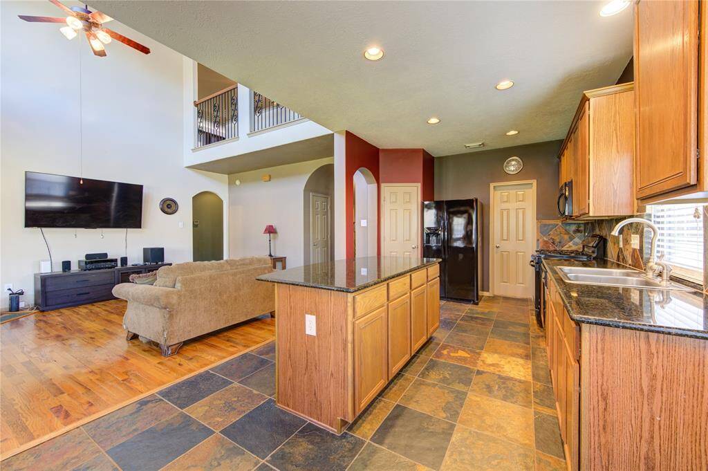 Open-Concept living opening the kitchen to Living room space