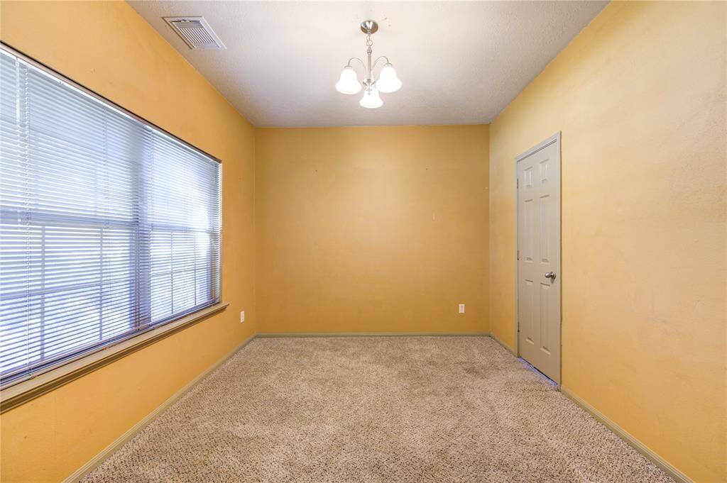 1st floor private office space or could be utilized as a dining room or a den