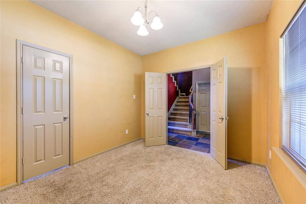 1st floor private office space or could be utilized as a dining room or a den