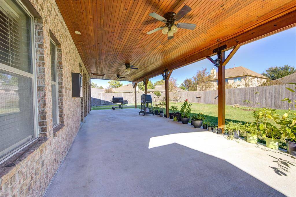 MASSIVE 40 foot wide custom covered patio to create memories with friends and family