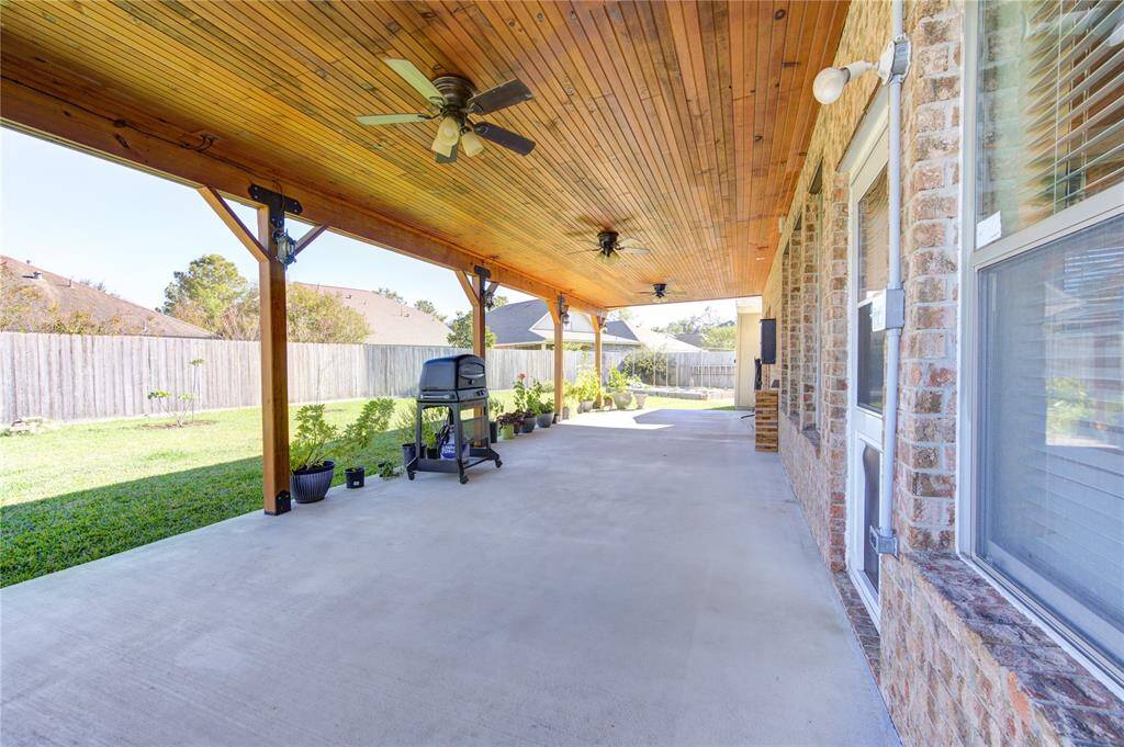 INCREDIBLE 40 foot wide custom covered patio to create memories with friends and family