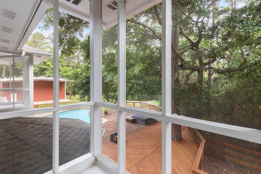 Experience breathtaking views from the master bedroom's screened balcony, designed for ultimate relaxation.