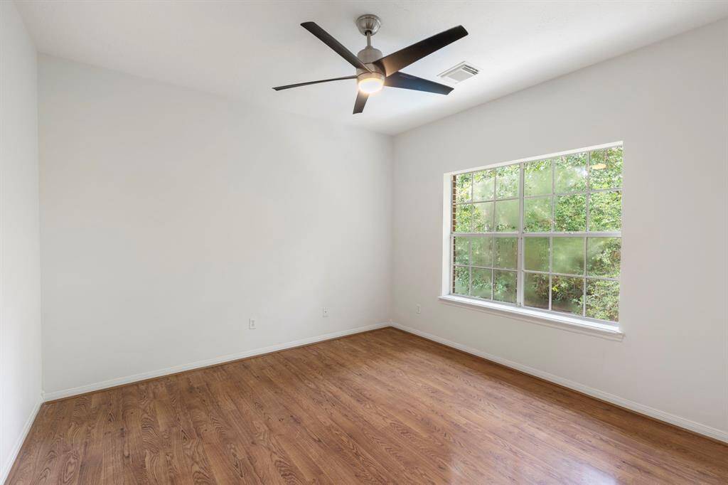Spacious third bedroom featuring a generous closet.