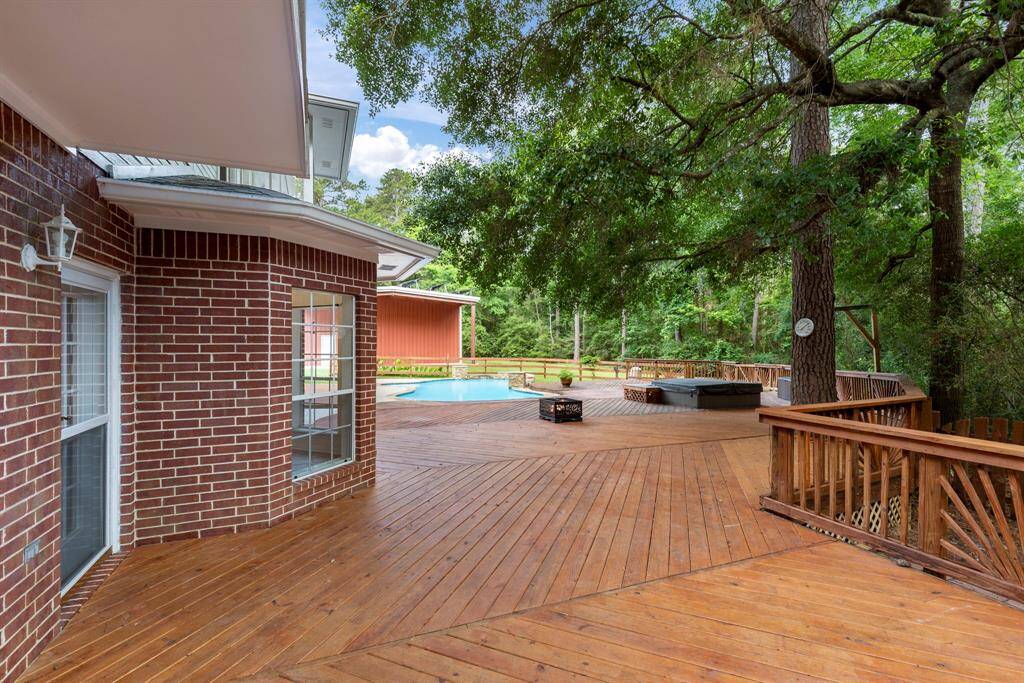 The recently refinished deck goes on and on for all your entertaining and relaxing needs