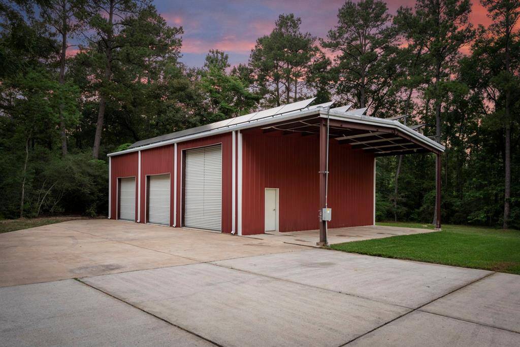 Shop offers 14' door and 15' overhang for a motor home or 2 cars