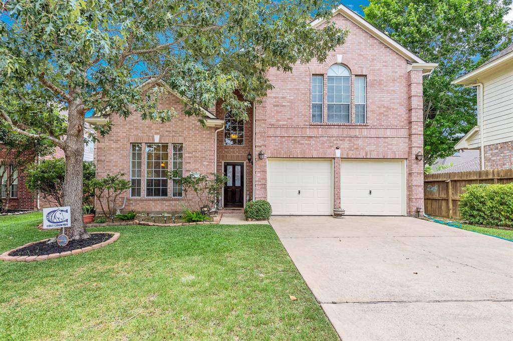 20014 Polly Creek Way is located at the end of a quiet cul-de-sac street.