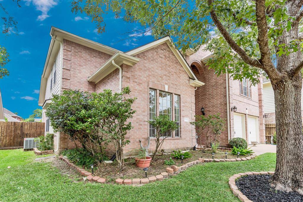 Yard maintenance is a breeze with sprinkler system and low-maintenance landscaping.