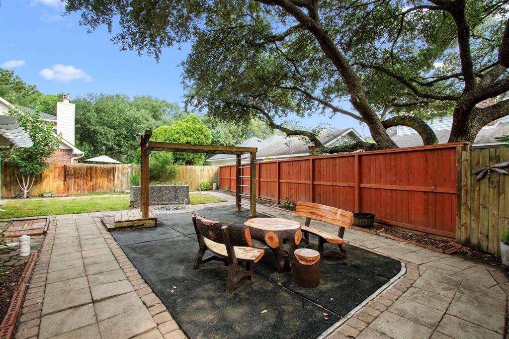 Sit and relax, while enjoying the shade of the trees in this well-established neighborhood.