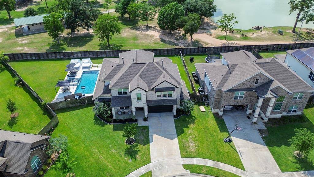 Amazing over-sized lot with 4 bedrooms and 4.5 baths, must see resort-style pool