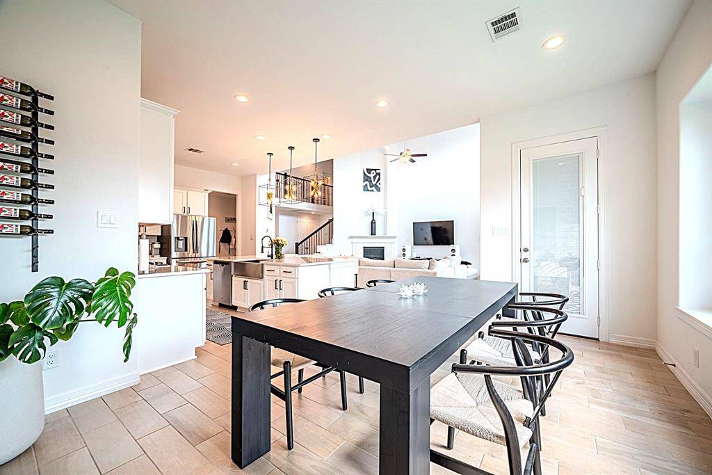 Dining area open to both kitchen and living room, perfect for entertaining and gathering