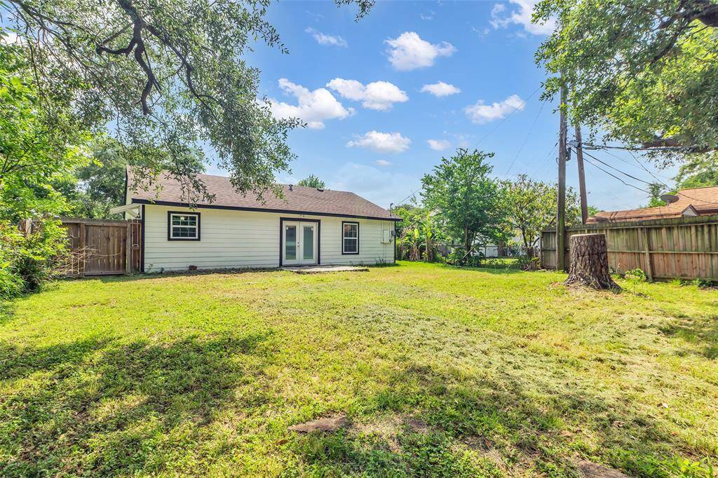 The spacious area is perfect for outdoor activities and gatherings, providing plenty of room to entertain or relax.