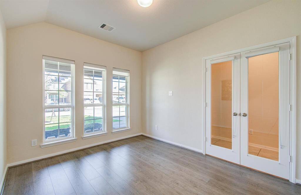 Study room/home office with French door.