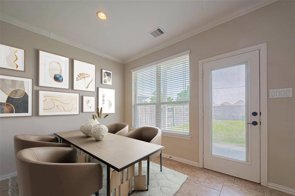 With furniture in place, this virtually staged breakfast space shows how cozy yet open it can be.