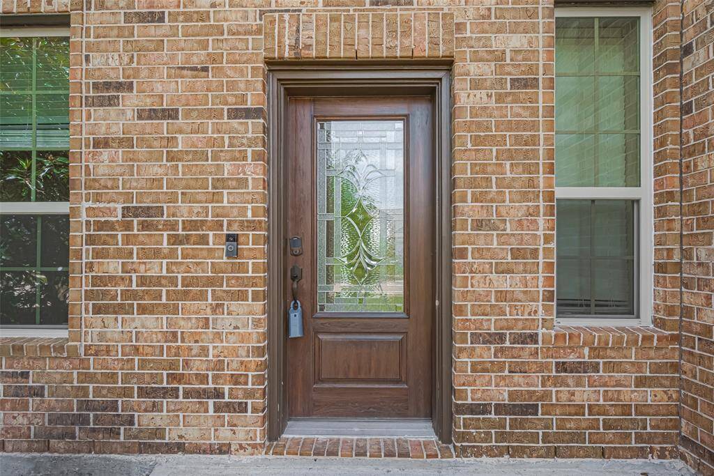 A close-up of the front entry offers a warm invitation—this is where your next chapter begins.