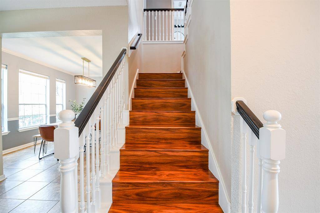 The staircase is a showstopper, featuring Beautiful Wood Laminate that offers look of Elegance