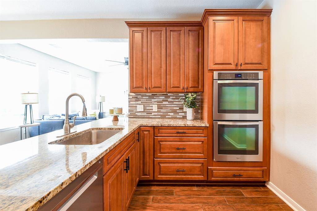 This kitchen features a double oven that makes cooking for a crowd or preparing multiple dishes a breeze