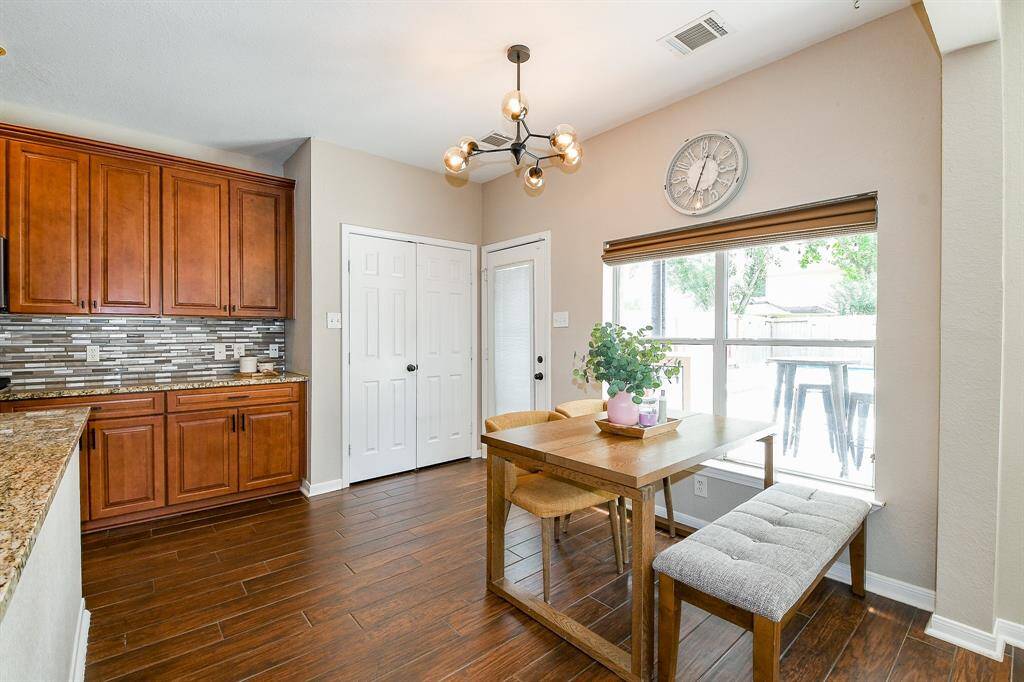 Kitchen Area features a Spacious Double Door Pantry