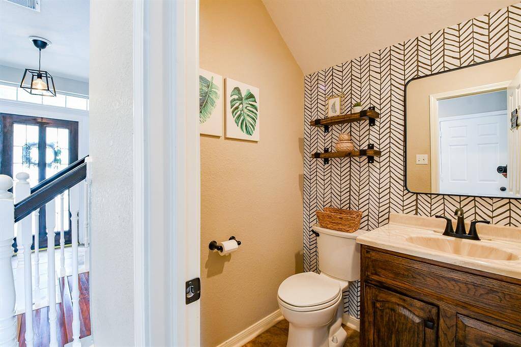 Uniquely designed Powder Room that combines Elegance with an Artistic Flair.