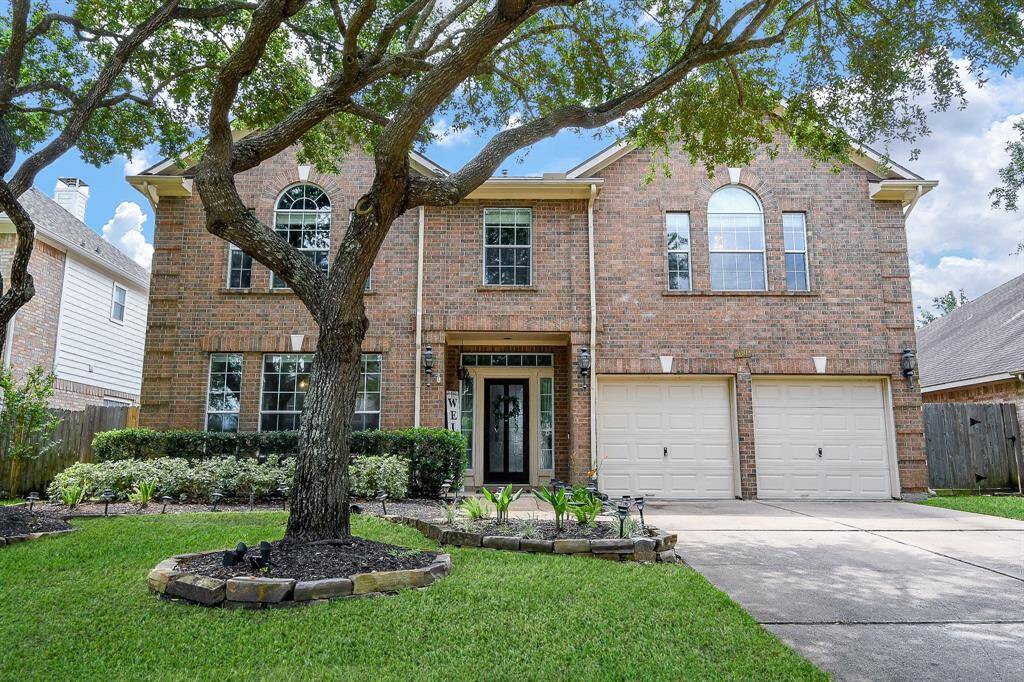 The Mature Trees offering natural shade, privacy, and a sense of tranquility that enhances the home’s curb appeal.