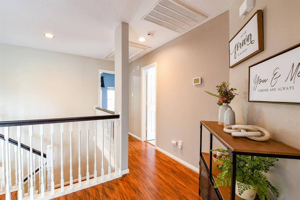 A Full Bathroom is thoughtfully positioned between the bedrooms, offering Easy and Convenient access.