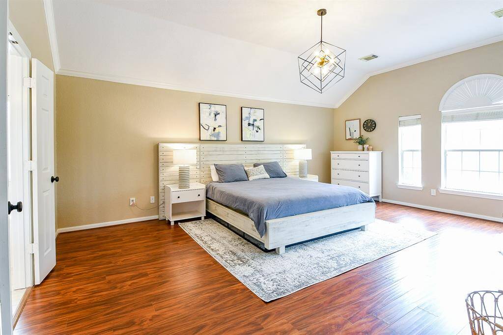 Step into your Private Sanctuary through Elegant Double Doors that open into the Spacious Owner’s Retreat.