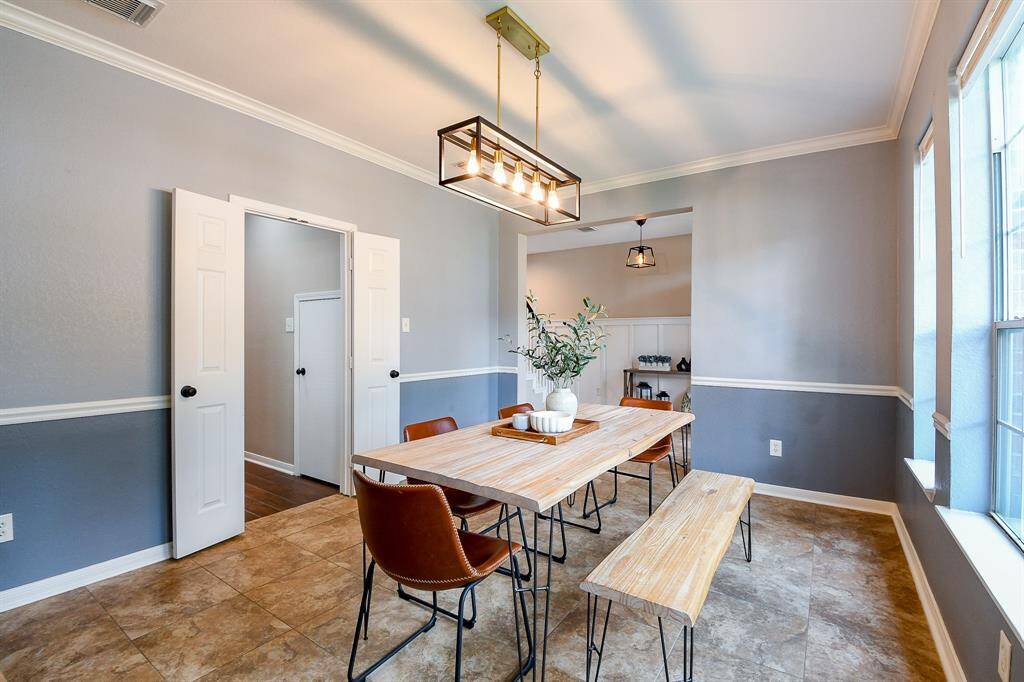 The layout offers easy access from the kitchen to the formal dining area, allowing the chef to effortlessly serve guests