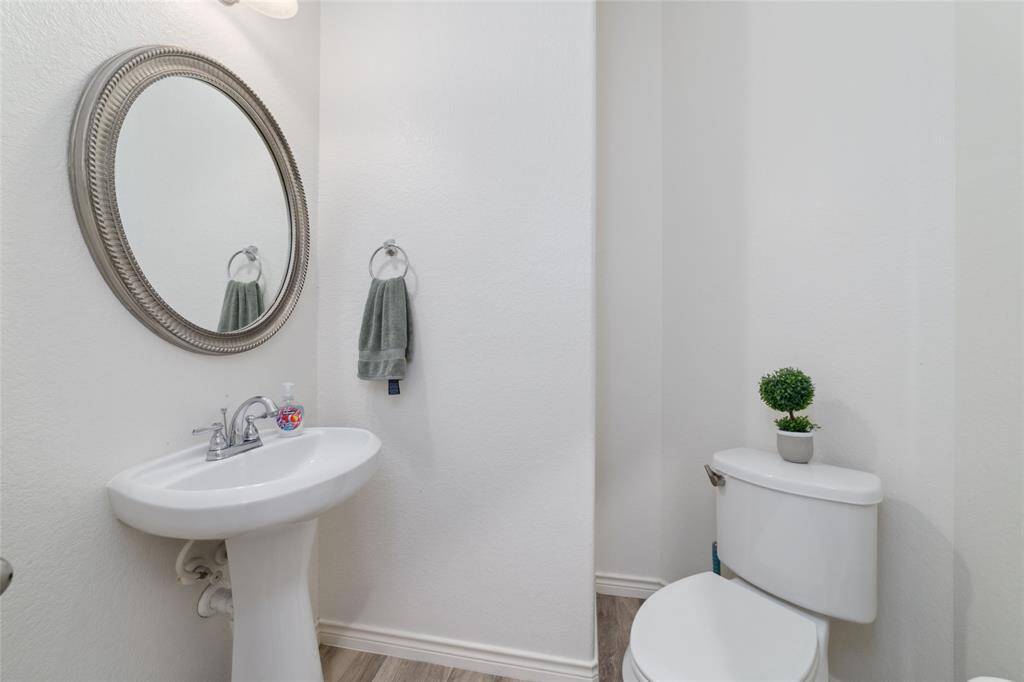 This powder room is convenient for family gathering and guests.
