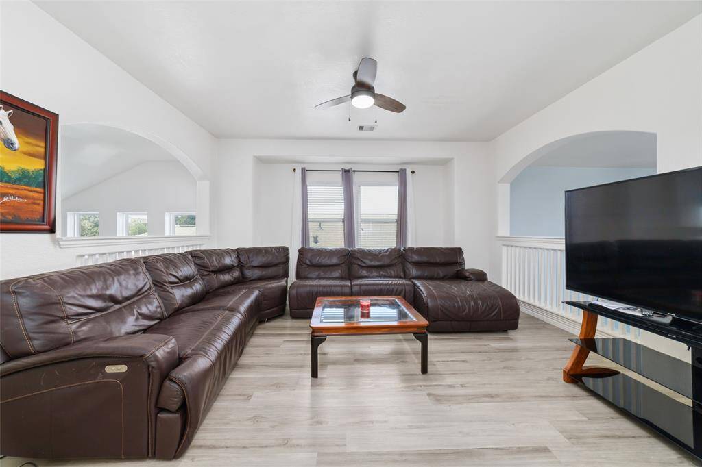 Generous size game room upstair that shadow over the living area.