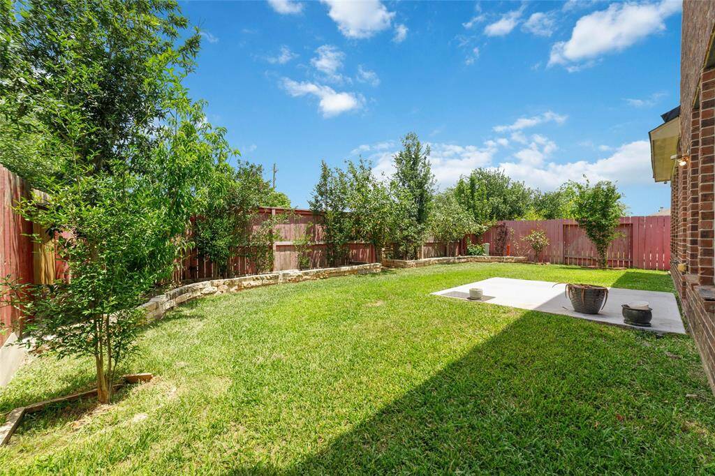 Non-back neighbor backyard with plenty of fruit trees and concrete cement area which ready to built a patio.