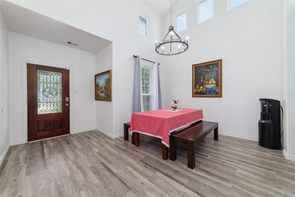 The entire house got wood-like tile flooring.