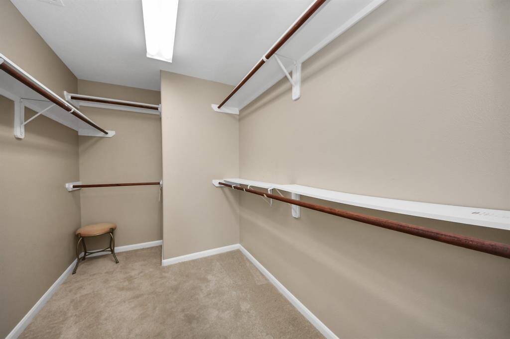 The walk-in closet combines practicality with storage convenience, ensuring that functionality seamlessly blends with sophisticated design.