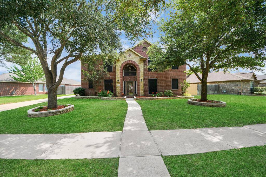 A spacious two-car detached garage is behind the property, and it adds both convenience and functionality, making this residence as practical as it is inviting.