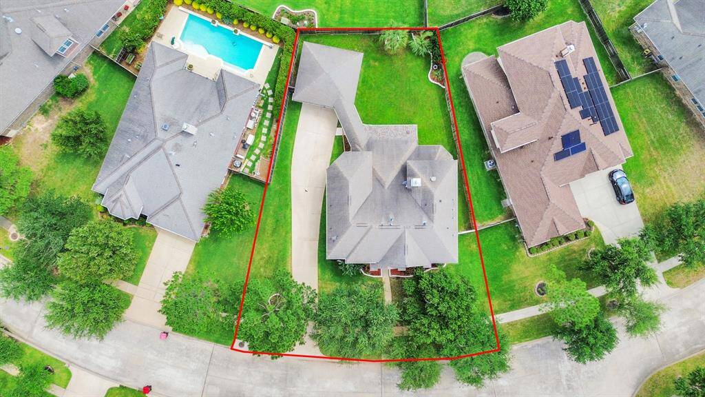 A directly overhead perspective reveals the sheer scale of the lot and its careful landscaping.
