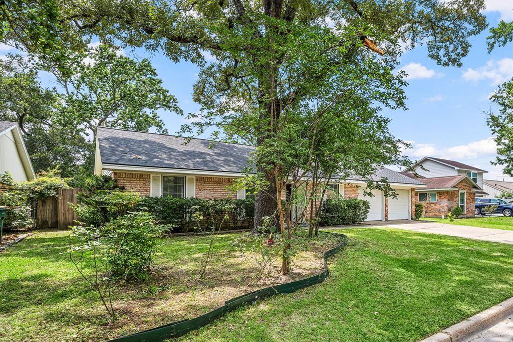 Charming single-story brick home with a spacious front yard, mature trees, and a two-car garage. Ideal for buyers seeking a cozy residence in a tranquil neighborhood.