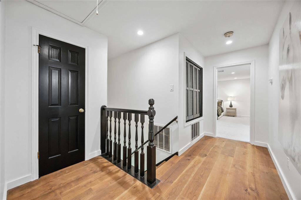 The landing leads to the primary bedroom.