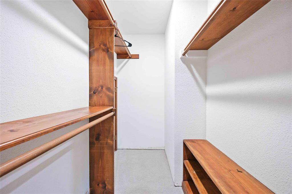 The 3rd bedroom includes a spacious closet with more built-in shelving.