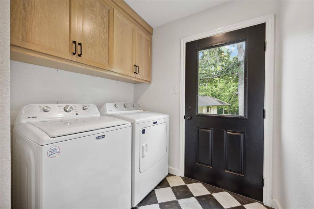 A roomy laundry on the 1st floor also offers outdoor access.